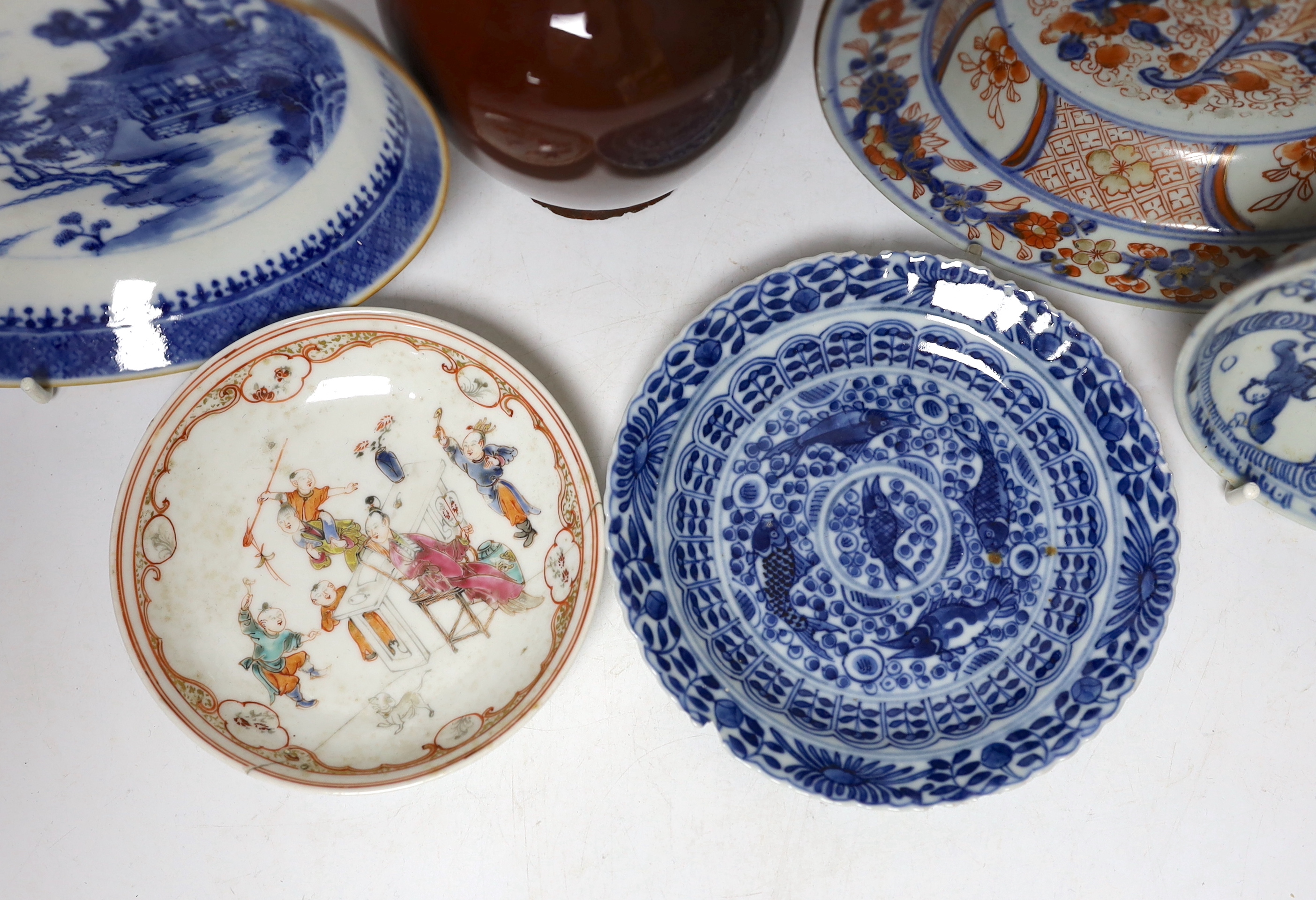 Five Chinese porcelain saucers and dishes and a sang de boeuf glazed vase, vase 21cm high